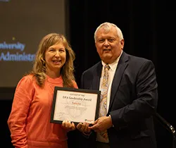 Bonny Ray Accepting Award